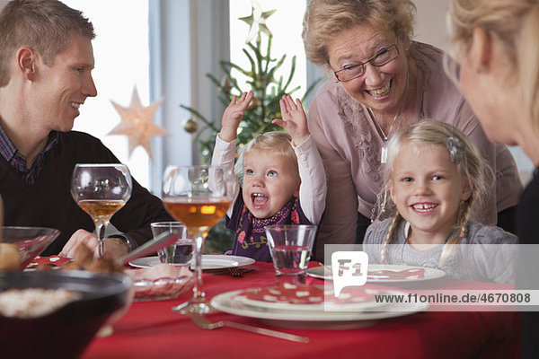 Glass Dinner Table on Happy Family At The Dinner Table   Buy Premium Quality Stock Photos